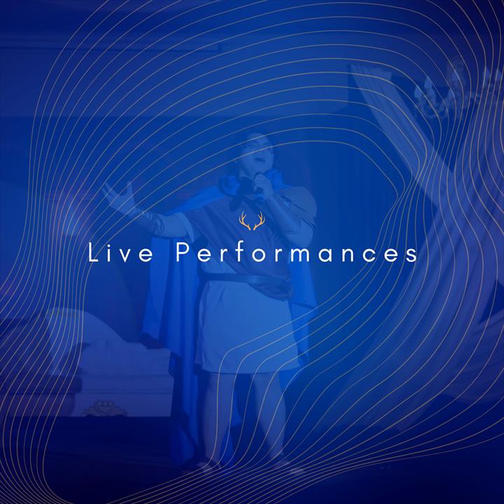 Ralskies performing as Javert on a blue-lit stage